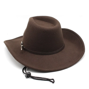 Detail of dark brown wool felt cowboy hat with leather band and windproof cord