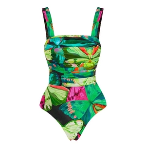 Slimming one-piece swimsuit featuring vibrant butterfly prints and ruched tummy control