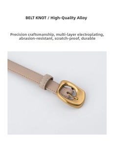 Close-up of premium beige lychee grain leather belt with elegant matte gold alloy buckle