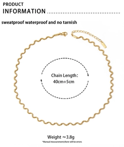 Detail of gold wave chain necklace showing 40cm length and lobster clasp closure