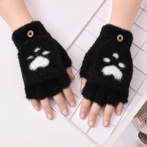 Detail of black fingerless gloves with white cat paw pattern and button cuff detail