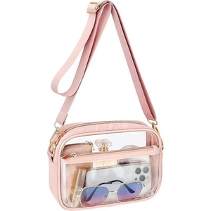 Clear PVC crossbody bag with pink PU leather trim and adjustable strap for travel storage
