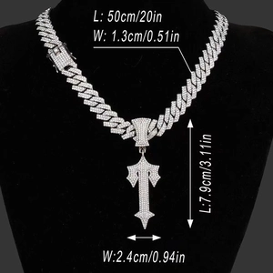 Silver iced out cross sword pendant with Cuban chain on bust, 50cm long for hiphop style