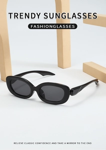 Fashion retro oval sunglasses with black frames displayed on a minimalist geometric prop