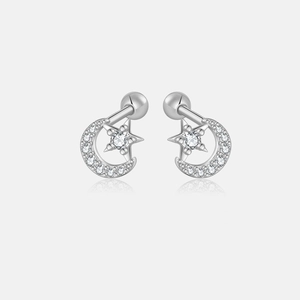 Detailed macro view of S925 silver star and moon stud earrings with zircon inlay