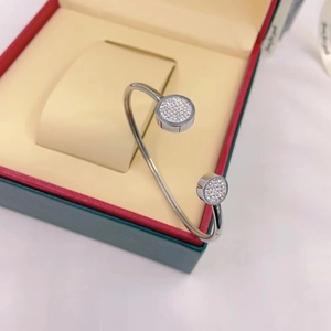 Polished silver terahertz energy stone open bangle with shimmering crystal disc ends