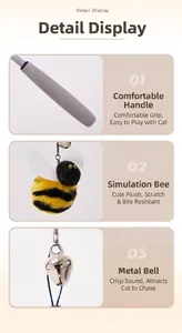 Detail view of the plush bee pendant, soft foam handle, and metal bell for cat wand