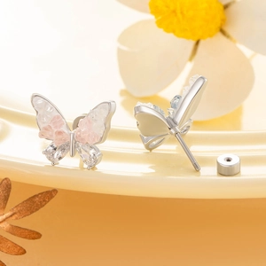 Clous d'oreilles papillon en argent avec pierres roses et fermoir à vis sécurisé