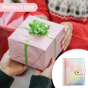 Festive holiday gift set featuring a holographic A7 budget binder in a pink gift box
