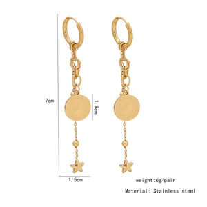 Detail of gold stainless steel coin and star earrings with Elizabeth II engraving