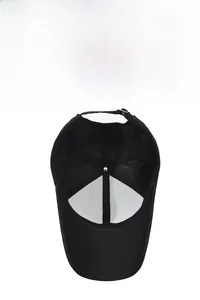 Detail view of the black baseball cap interior with reinforced seams and adjustable metal buckle