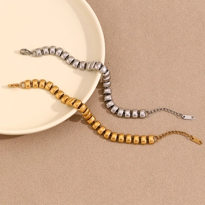 Detail of 18K gold and silver plated stainless steel segmented bean chain bracelets