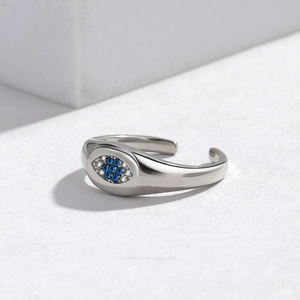 Detailed close-up of Evil Eye adjustable silver ring featuring blue zircon and pavé crystals