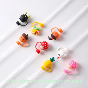 Detail showing various 10mm silicone straw toppers in colorful cartoon fruit and plant shapes