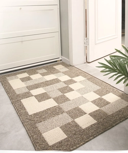 Detail view of anti-slip entryway mat with brown and white checkerboard pattern texture