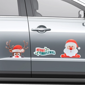 Detailed view of reindeer and Santa Claus magnetic car stickers with Merry Christmas text