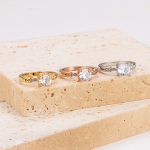 Three-color stainless steel four-prong rings set in gold, rose gold and silver finish