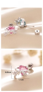 Detail of pink heart stud earrings with cubic zirconia bow and flat back screw design