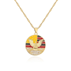 Detail of 18K gold plated necklace with bird pendant and colorful enamel stripes