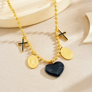 Gold beaded necklace featuring black oil drip cross and oval Virgin Mary pendants
