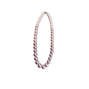 Gradient pearl necklace from white to deep lilac with elegant silver clasp on white base