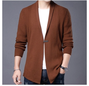 Detail view of men's brown knitted cardigan blazer showing sleeve and metal buckle