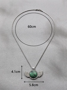 Détails du collier cœur : chaîne 60cm, hauteur pendentif 4,1cm et largeur 5,8cm précises