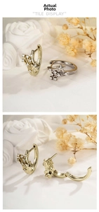 Detailed view of shooting star earrings with zircon inlay and elegant tassel drops
