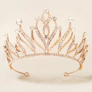 Detailed view of the luxury gold alloy crown featuring sparkling crystals and leaf patterns