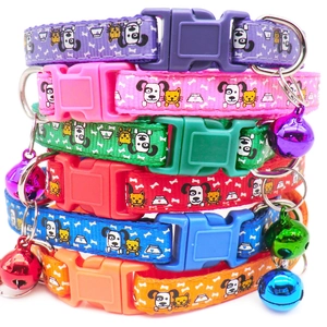 Detail view of 6 colorful nylon pet collars with snowflake patterns and metal bells
