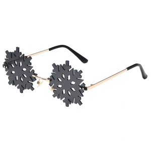 Frameless snowflake shaped sunglasses with black lenses and golden metal temples