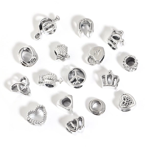 Assorted silver alloy charms including heart, crown, and music notes for DIY jewelry