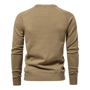 Rear view of khaki cotton knit sweater featuring raglan sleeves and ribbed hem details