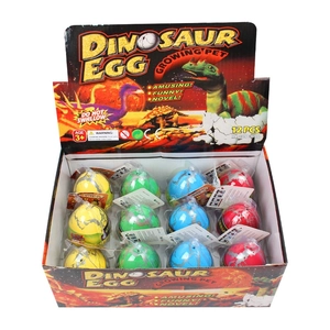 Set of 12 colorful hatching dinosaur egg toys in display box for growing pet fun