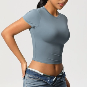 Close-up of slim-fit blue-grey athletic crop top with high-elastic fabric and crew neck