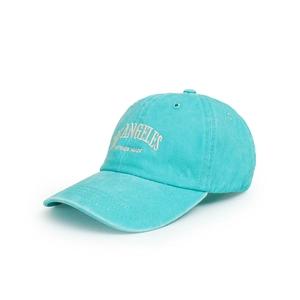 Detail of the Los Angeles vintage embroidery on a washed cotton blue baseball cap