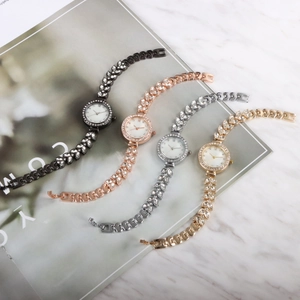 Luxury mermaid style ladies watches with rhinestone straps in gold, silver, and rose gold