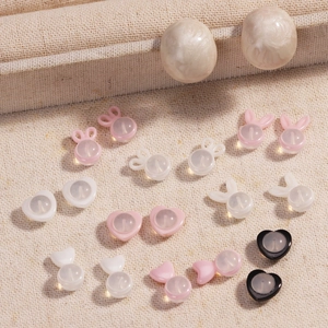Pink heart and rabbit ear shaped ceramic earring backs with silicone earring accessory set