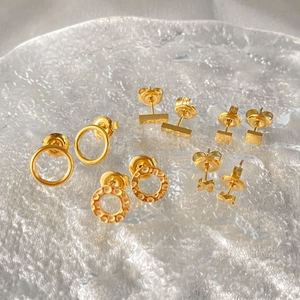 Luxury gold-plated stud earrings set featuring hammered and minimalist geometric designs