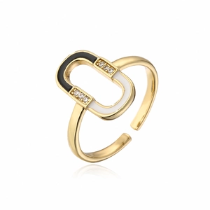 Detail of 18K gold plated ring featuring black and white enamel link design with zircons