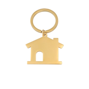 Polished gold house shaped keychain with hollow door design on white background