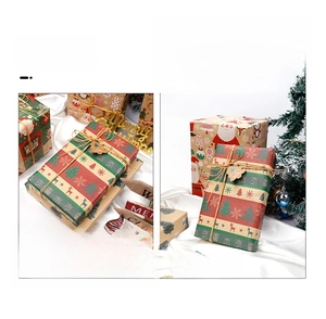 Detailed view of Christmas kraft paper gift boxes with rustic twine and festive tags