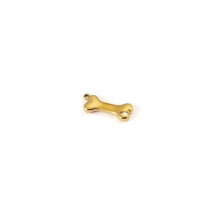 Golden bone-shaped pendant with a sparkling crystal zircon for DIY jewelry making