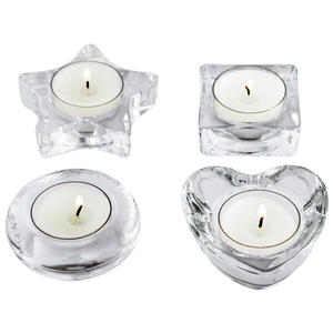 European glass tealight holders in star, square, round and heart shapes with lit candles