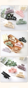 Close-up of floral pattern hair claw clips in various colors with high-quality matte finish