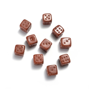 Detailed view of ten 15mm brown glitter stone dices arranged in a circle for DIY crafts