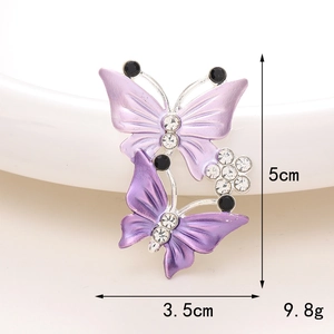 Squisito ciondolo a farfalla viola con strass bianchi e pietre preziose nere, 5x3,5cm
