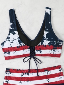Detail view of American flag print bikini with tie-front top and high-waisted bottom