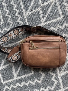 Brown PU leather crossbody bag featuring bohemian floral embroidery on wide strap