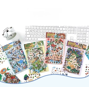 Close-up of 2.5D isometric scene stickers set on a keyboard for DIY scrapbooking deco